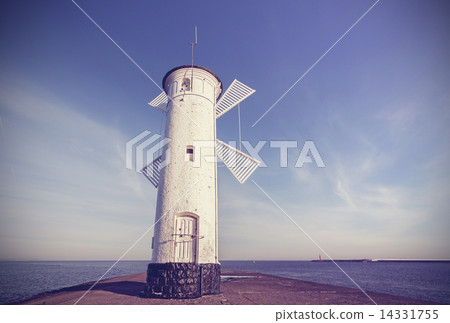 Old windmill lighthouse in Swinoujscie, Poland. Old windmill lighthouse in Swinoujscie, Poland. 14331755