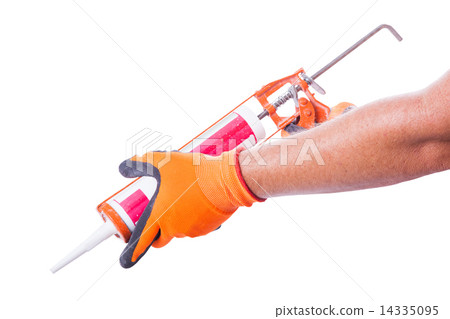 male hands work gloves hold sealant gun 14335095