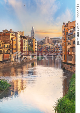 Sunset in Old Girona town, view on river Onyar 14335314