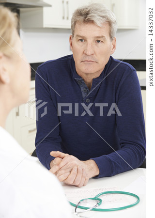 Worried Mature Woman Meeting With Doctor In Surgery 14337032