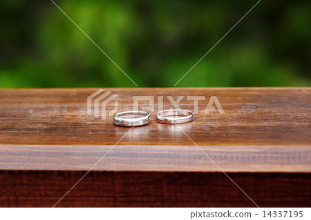 Wedding rings close up in rustic style Wedding rings close up in rustic style 14337195