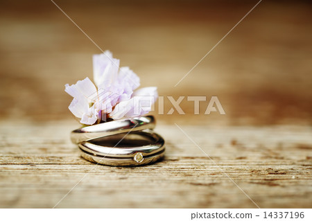 Wedding rings close up in rustic style Wedding rings close up in rustic style 14337196