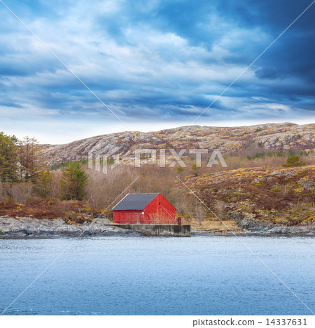 Traditional Norwegian red wooden boat barn with crane Traditional Norwegian red wooden boat barn with crane 14337631