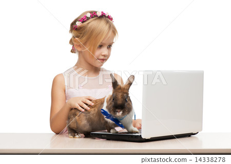 Girl and brown bunny with the computer Girl and brown bunny with the computer 14338278