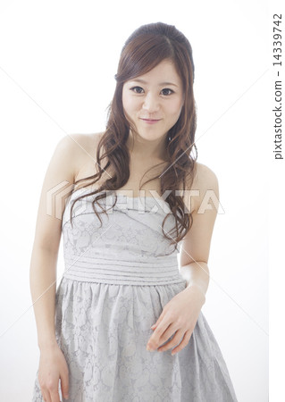 A woman in a dress A woman in a dress 14339742