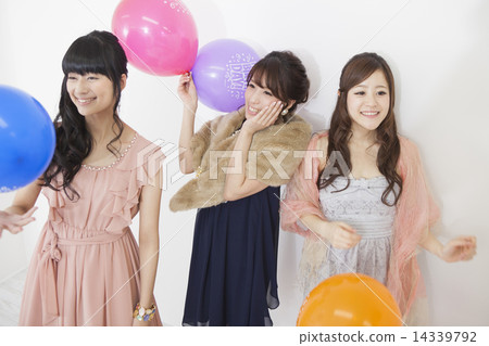 A woman with a balloon 14339792