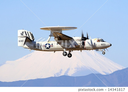 US Navy E-2C Hawkeye Early Warning aircraft flying against Mt. Fuji snow makeup under the clear winter sky 14341817