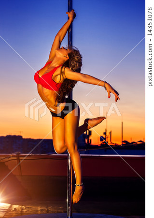 Young pole dance woman 14351078