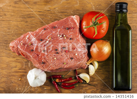 raw beef fillet with spices and vegetables 14351416