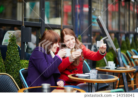 Two girls making self picture (selfie) 14358041