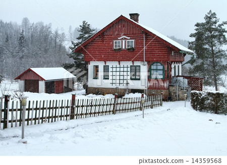 Cottage during snow storm Cottage during snow storm 14359568