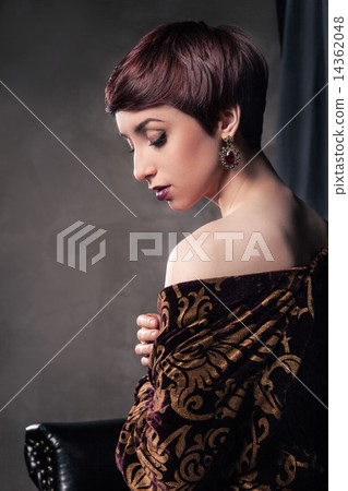 Portrait of young woman with short hair  14362048