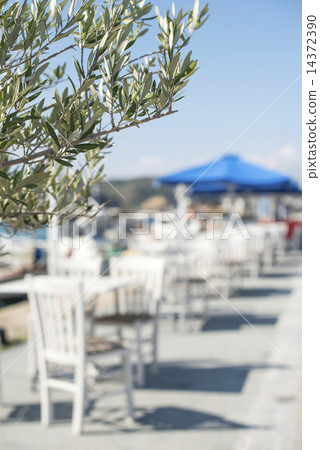 Typical greek restaurant and boat Typical greek restaurant and boat 14372390