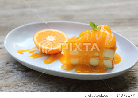 Orange cake on wood background 14375177
