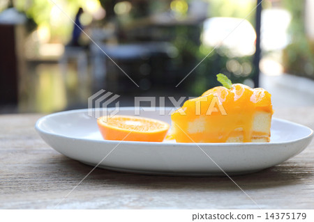Orange cake on wood background 14375179