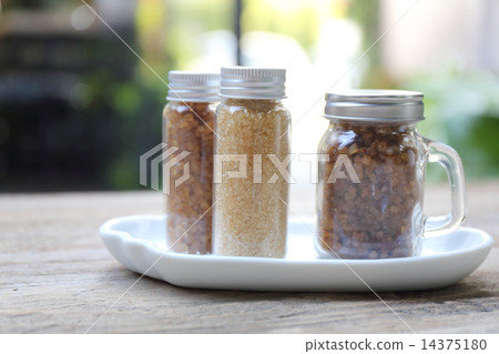 Sugar on wood background Sugar on wood background 14375180