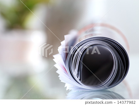 Roll of newspaper 14377982