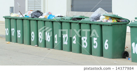 Row of large green bins Row of large green bins 14377984