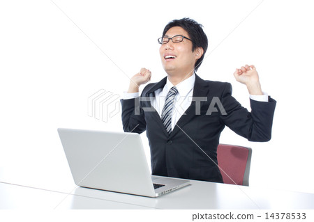 A businessman who works / grows at a personal computer 14378533