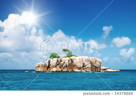 Deserted rocky island in the ocean. 14378889