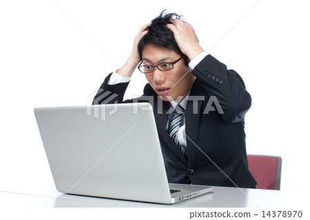 A businessman holding a work / head with a personal computer 14378970