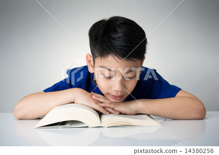 Little asian boy read a book Little asian boy read a book 14380256