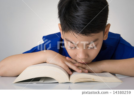 Little asian boy read a book Little asian boy read a book 14380259