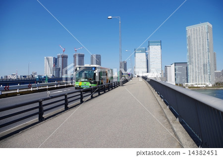 City bus running over the bridge City bus running over the bridge 14382451