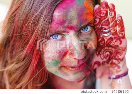 Portrait of girl with colorful paint on her face Portrait of girl with colorful paint on her face 14386195
