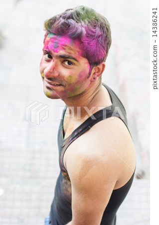 Portrait of Indian guy with Holi paints 14386241
