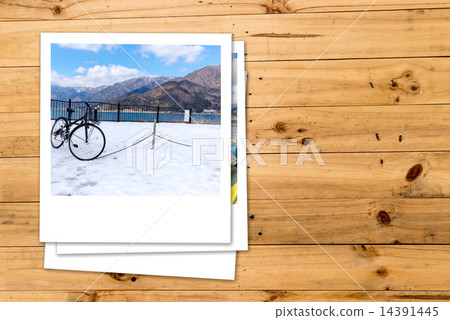 Stack of photographs Memory traveling with bicycle Stack of photographs Memory traveling with bicycle 14391445