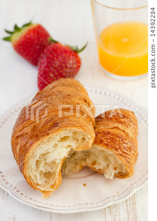 croissant with strawberry and orange juice croissant with strawberry and orange juice 14392284
