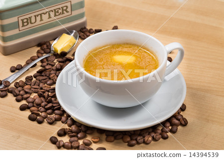Coffee with milk and added butter Coffee with milk and added butter 14394539