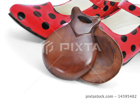 spanish castanets and typical dot-patterned red flamenco shoes spanish castanets and typical dot-patterned red flamenco shoes 14395482