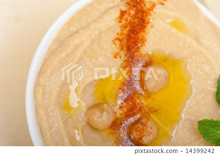 Hummus with mint on top 14399242