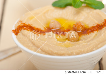 Hummus with mint on top 14399243