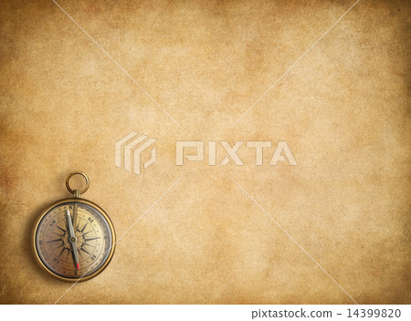 Brass compass on blank vintage paper background Brass compass on blank vintage paper background 14399820