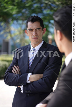 Two office workers confronting each other 14400348