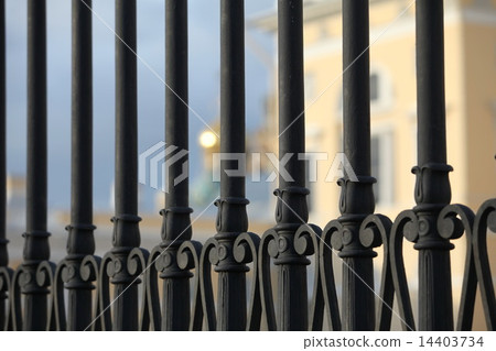 Sun behind the fence 14403734