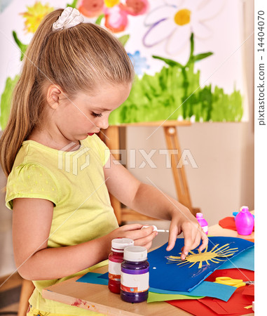 Child girl glue in preschool. Child girl glue in preschool. 14404070