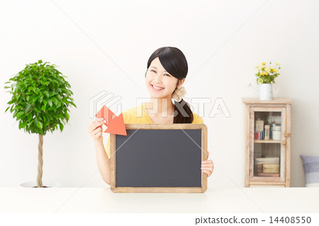 A woman pointing the message board with an arrow A woman pointing the message board with an arrow 14408550