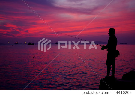 Silhouette of fishing man beside the sea Silhouette of fishing man beside the sea 14410203