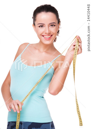 Young fit woman with measure tape 14410448