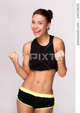 Mixed race sporty woman gains victory Mixed race sporty woman gains victory 14410629