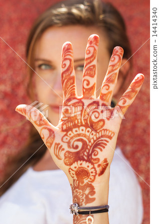 Mehendi on the hand of pretty girl Mehendi on the hand of pretty girl 14414340