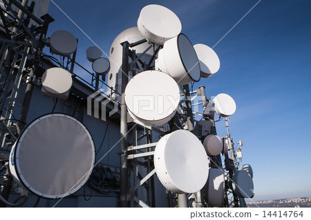 Telecommunications tower with many satellite dish Telecommunications tower with many satellite dish 14414764