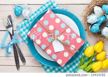 Easter with yellow tulips and colorful eggs 14414785