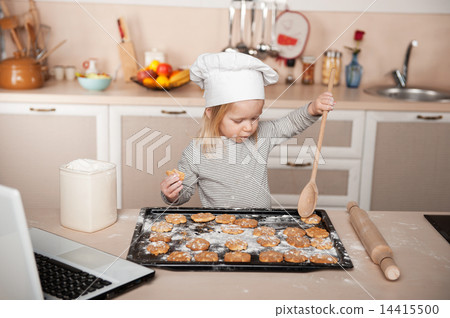 Little cute girl preparing cookies 14415500