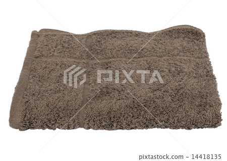 Folded brown bath towels islated in studio on white background 14418135