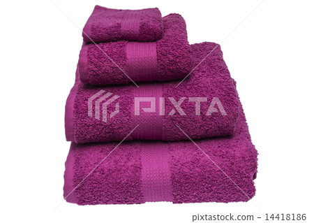 Folded pink bath towels islated in studio on white background 14418186